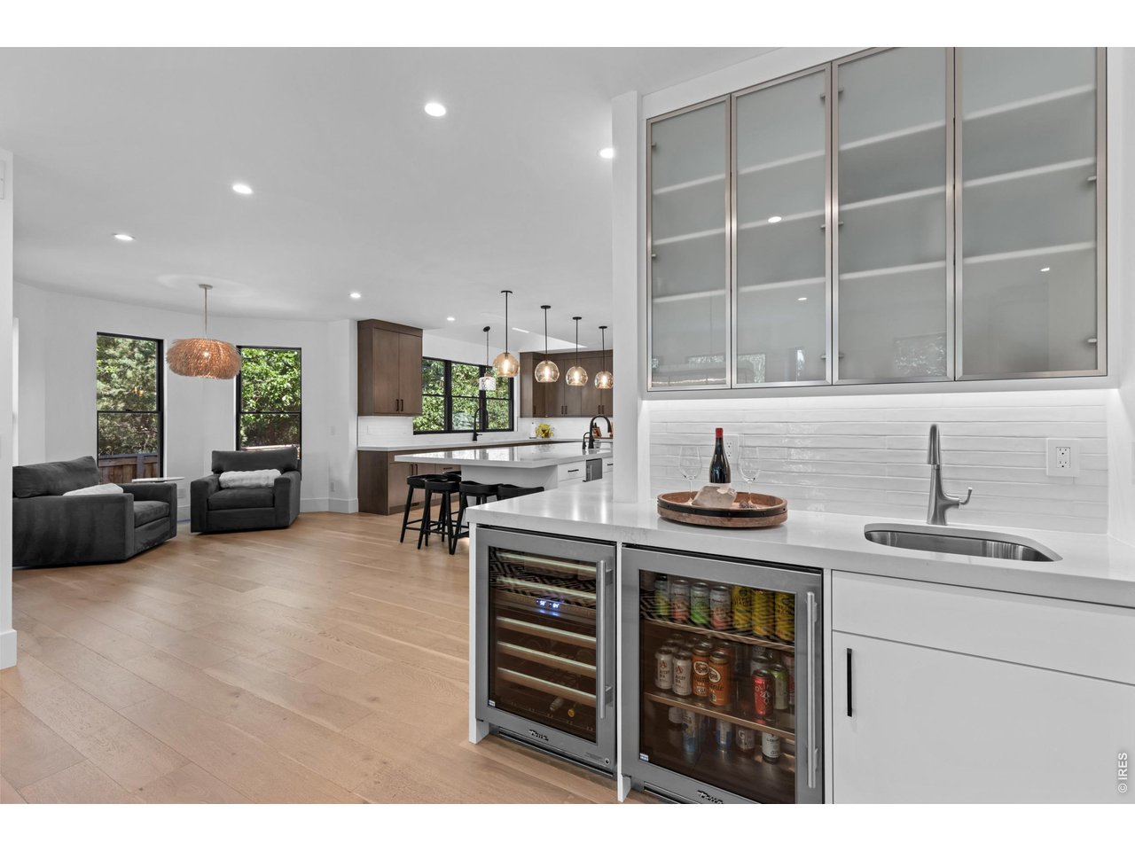 View from Living Room to Wet Bar & Kitchen