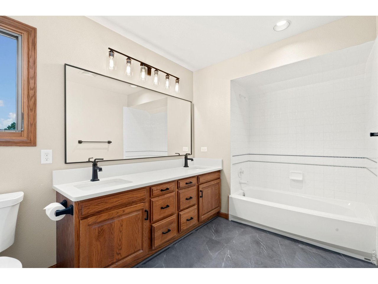 Property Photo 32 Upper Floor Full Bathroom with 2 sink vanity