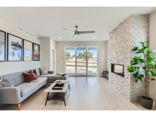 Property Photo 9 Living Room with a view to patio & back yard