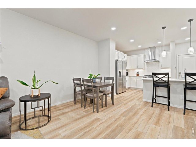 Property Photo 6 Dining space flows right into the kitchen.
