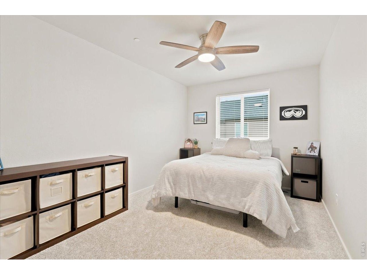 Property Photo 12 Bright secondary bedroom with a walk-in closet.