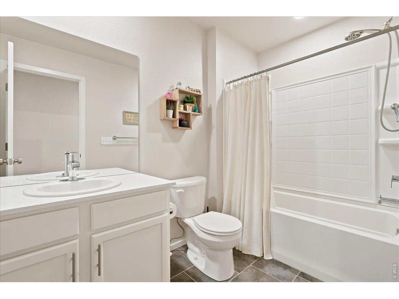 Property Photo 14 Full secondary bath upstairs.