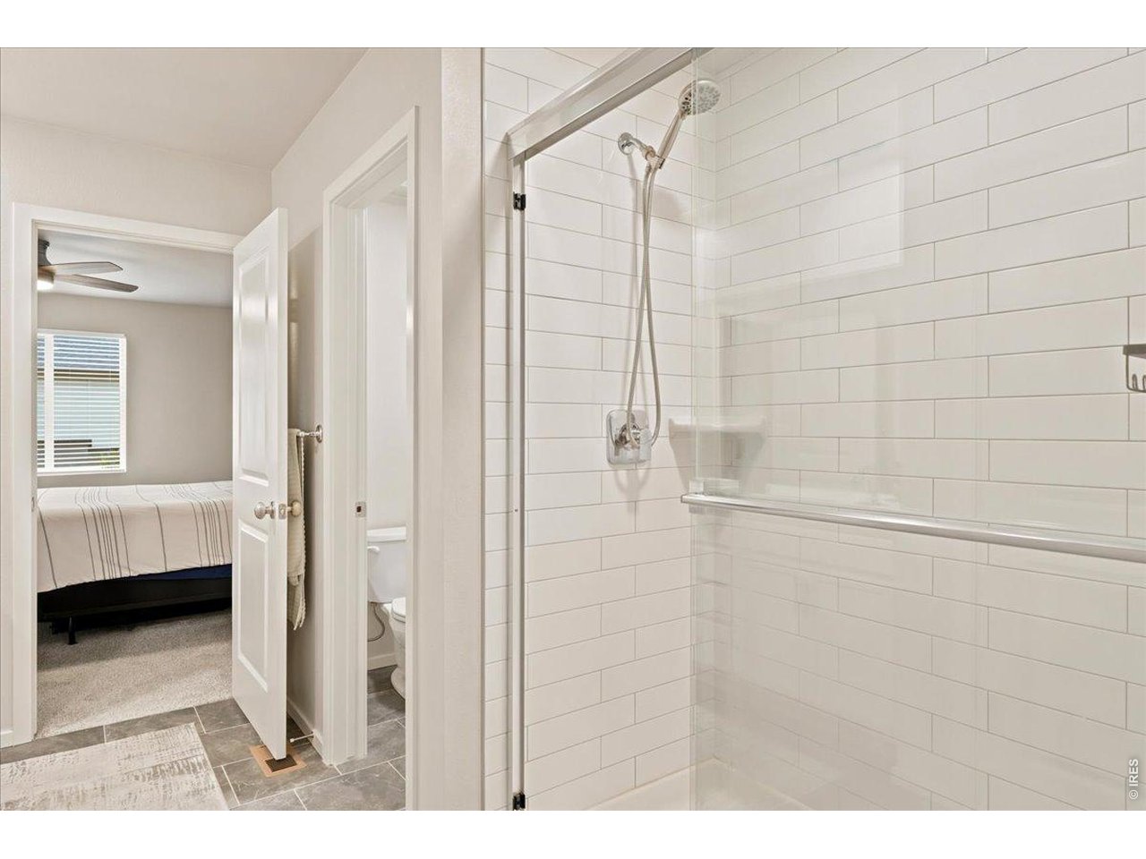 Property Photo 11 Primary suite walks straight into the ensuite and walk-in closet. No detail missed.