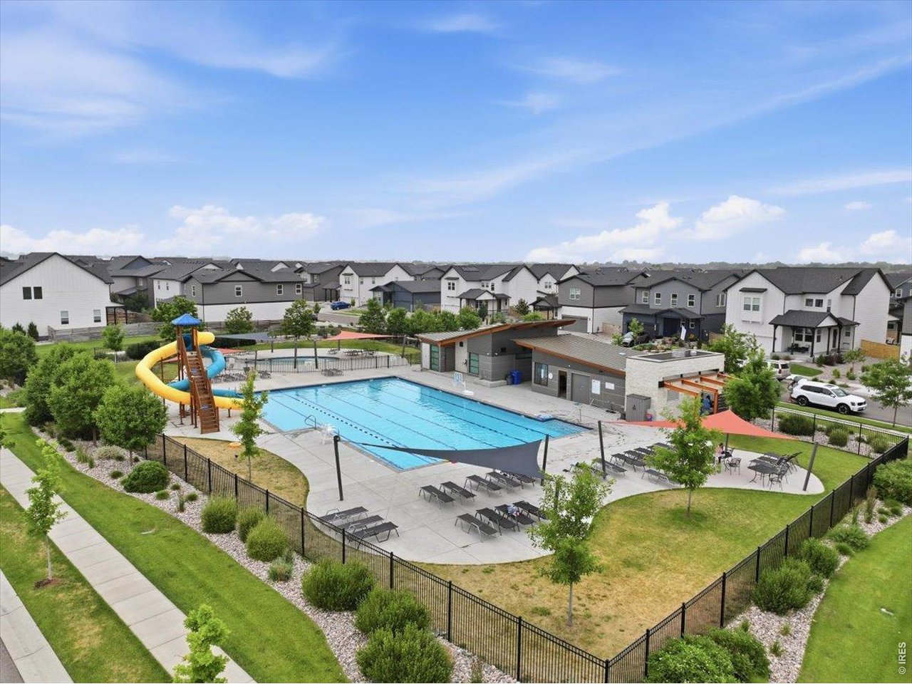Property Photo 18 Resort-style community pool with a water slide.