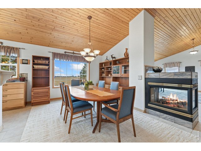 Property Photo 6 The cozy fireplace warms this inviting space!
