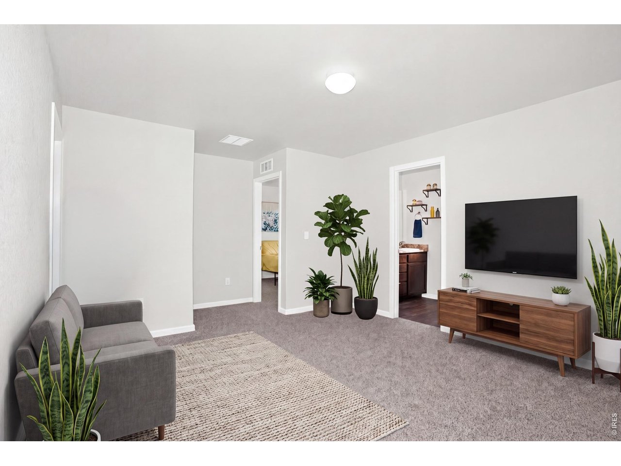 Property Photo 17 The loft "hub" of the upstairs has endless possibilities! Seen here as a 2nd TV/Media area...