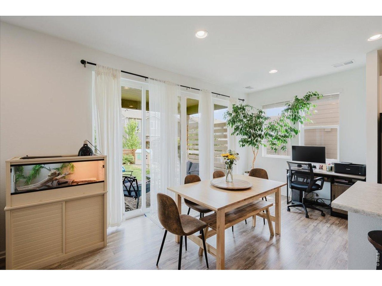 open the huge sliding doors to the backyard