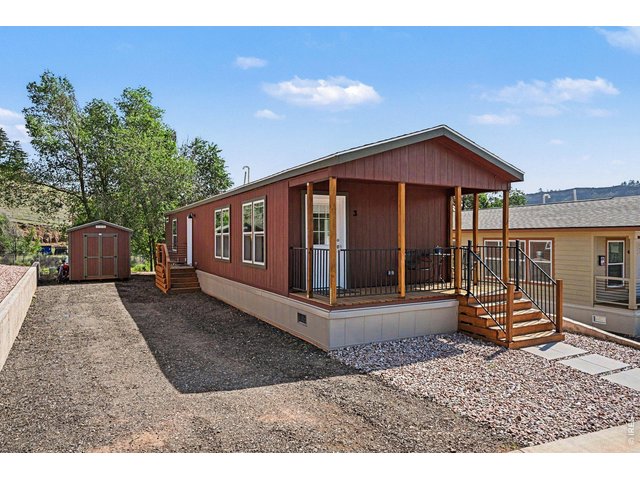 Property Photo 1 2 parking spots + Storage Shed
