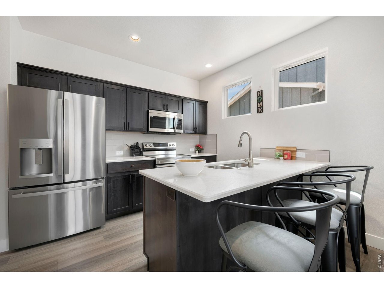 Property Photo 5 Stainless appliances all included. Microwave vents to the exterior.