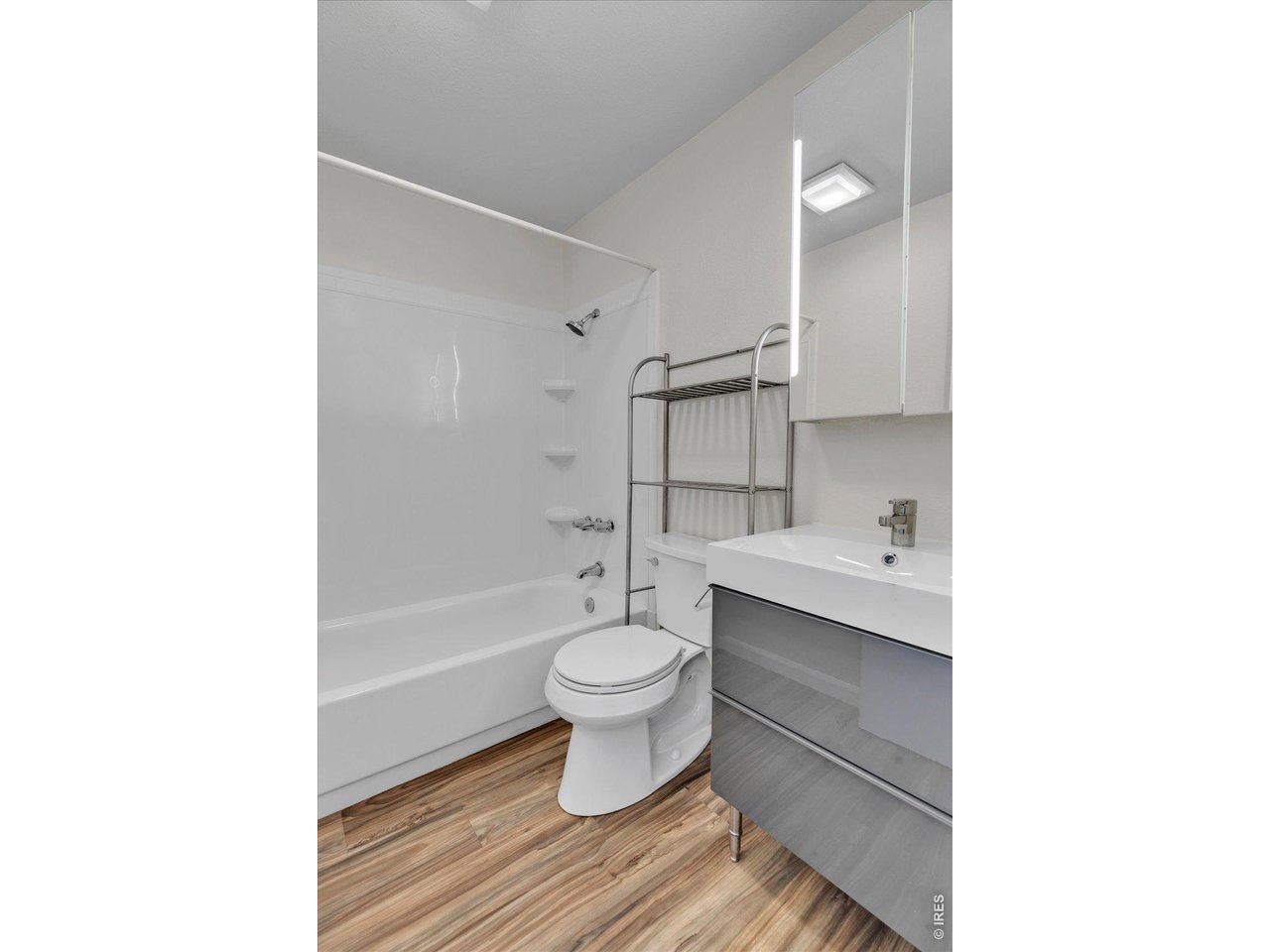 Remodeled bathroom with new shower surround