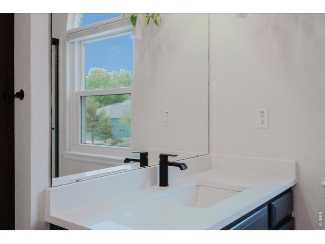 Property Photo 24 primary bathroom (dual vanities)
