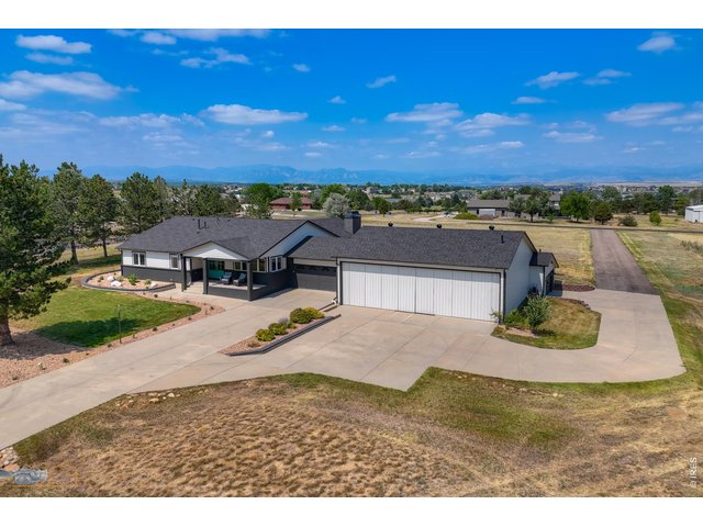 Property Photo 1 Heated Hangar, Two Car Garage, and Additional Four Car Garage