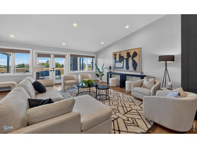 Property Photo 6 Vaulted Ceilings and Wall of Windows From Entry