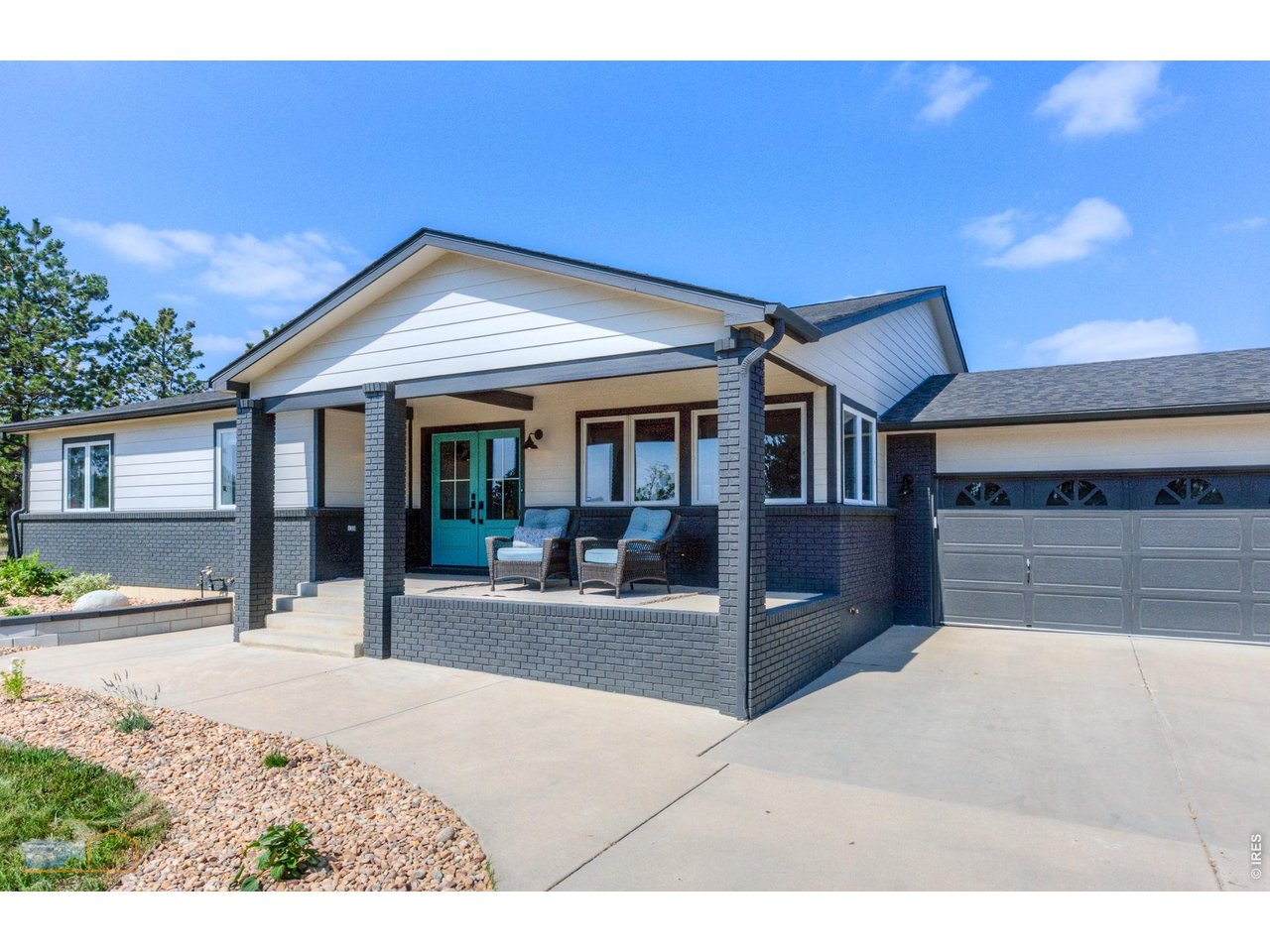 Front Porch and One of the Attached Garages