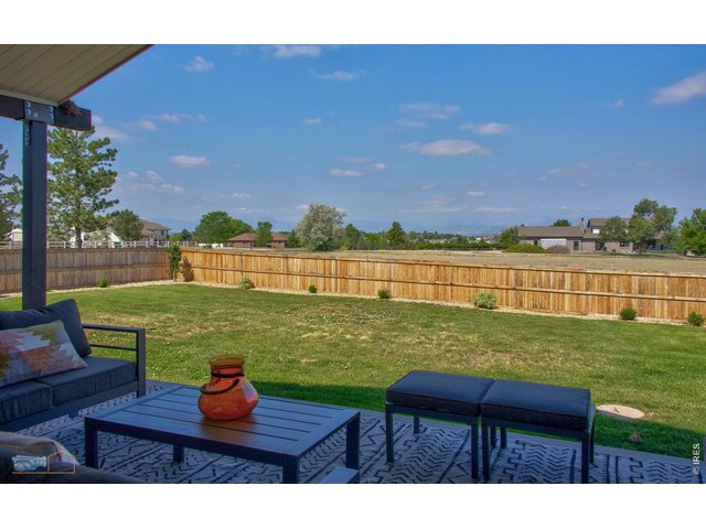 Property Photo 22 Fenced Backyard with Views (Obscured by Smoke)