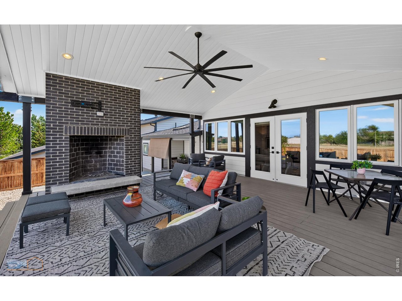 Covered Deck Leading to Large Patio