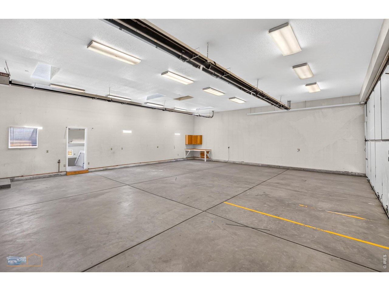 Hangar Includes a Half Bathroom, Hose Spigot, Large Shop Sink