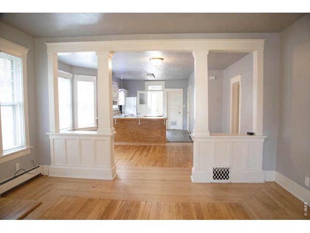 Property Photo 4 The hardwood floors on the main level were all refinished in 2023.