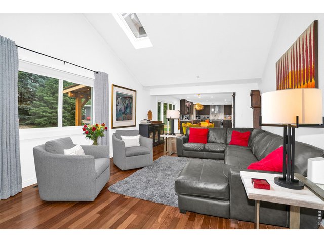 Property Photo 17 family room flows directly into the dining and kitchen