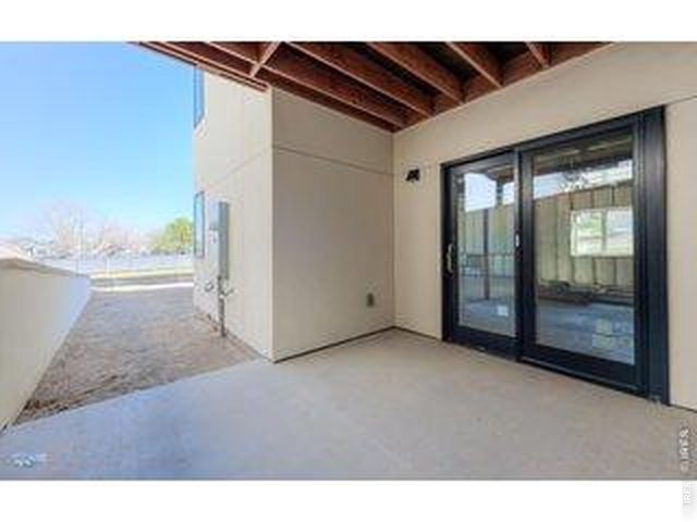 Property Photo 24 Covered Patio On Walkout level: Example Of Covered Patio From Previous House In Trail Ridge West