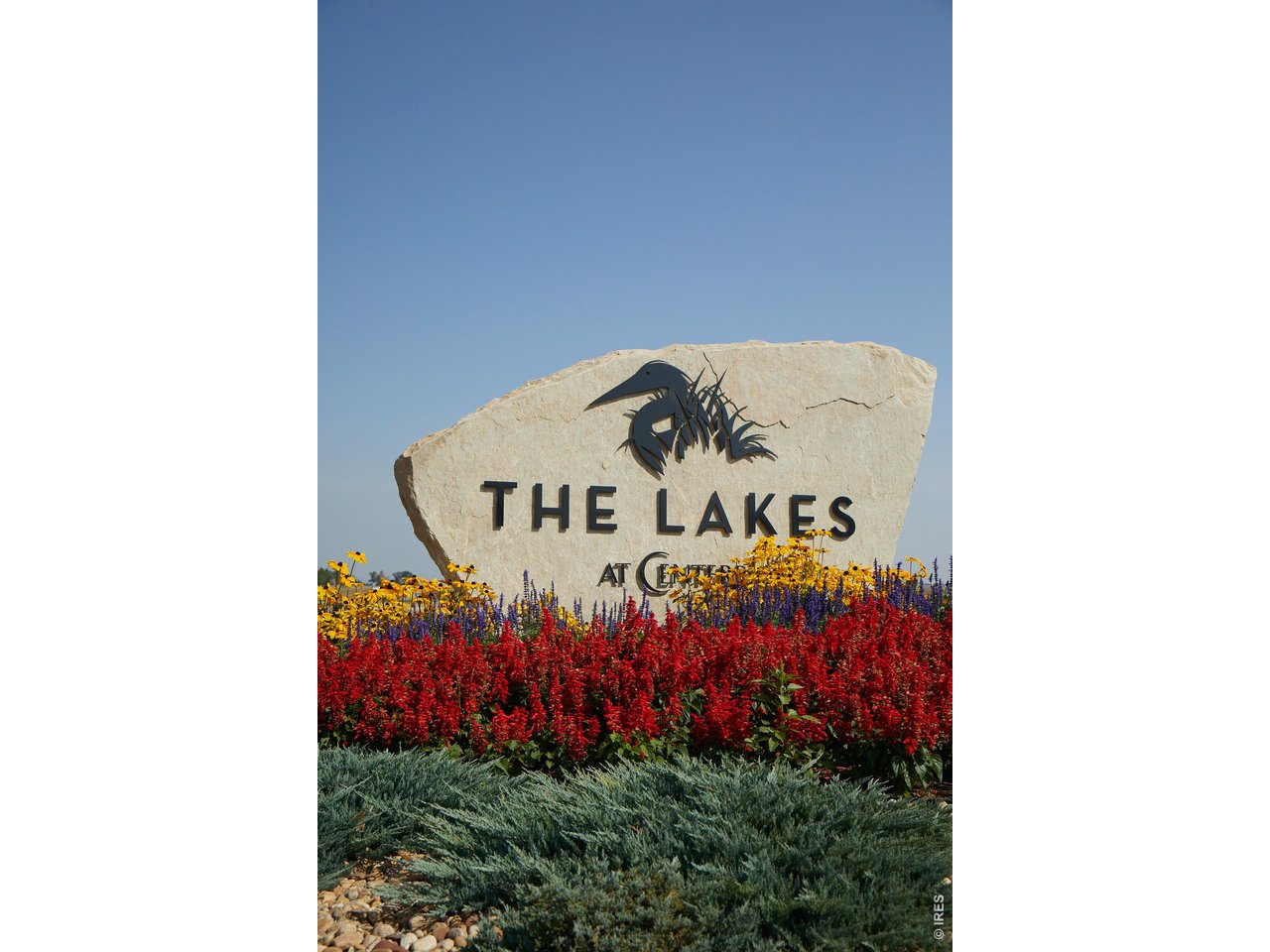 Property Photo 34 Welcome to the Lakes at Centerra, where nature and convenience meet!