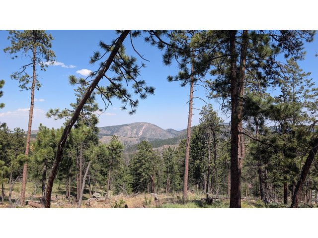 Property Photo 1 Views of surrounding mountains