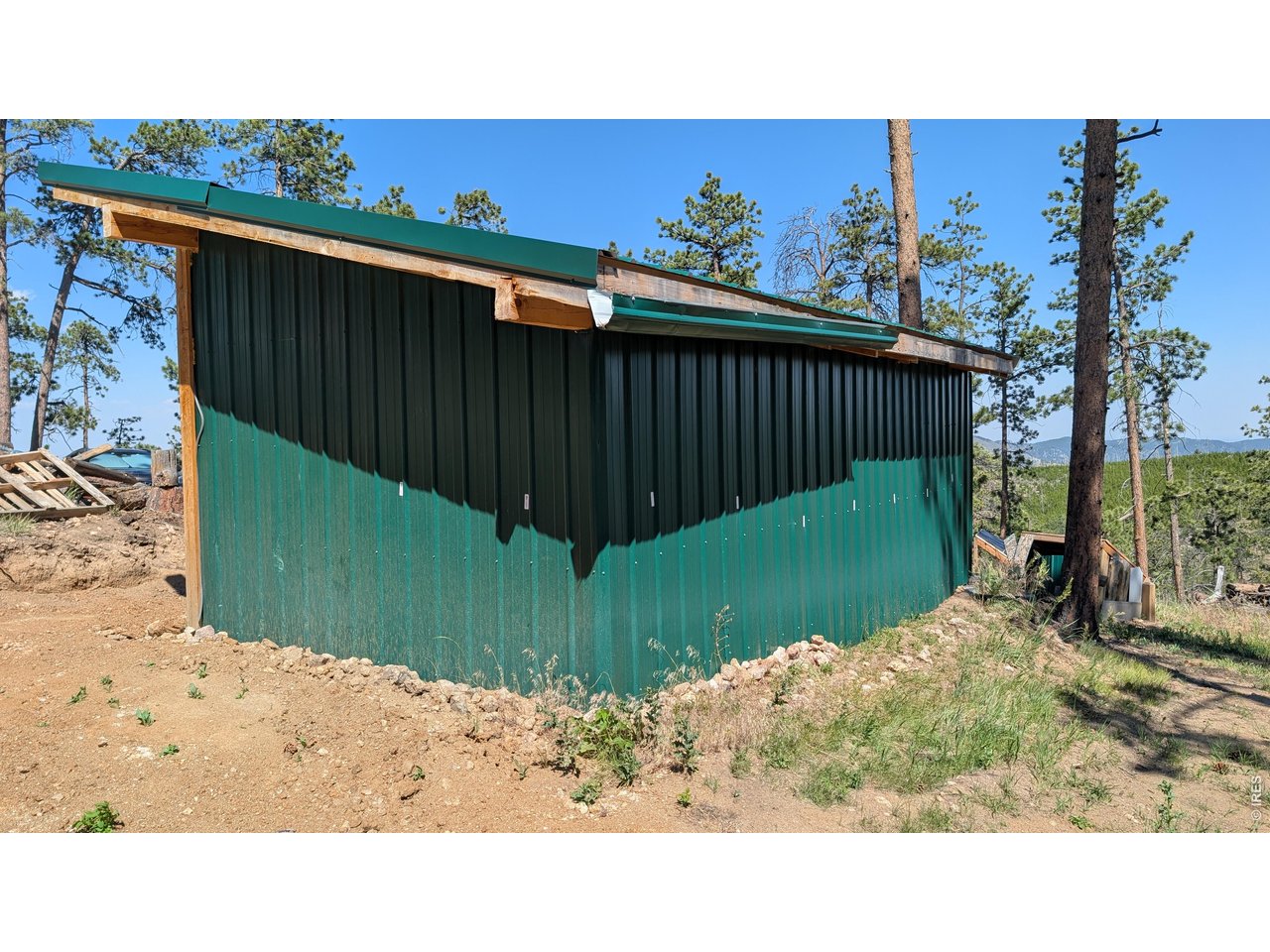 Property Photo 31 Sides, rear and roof are metal