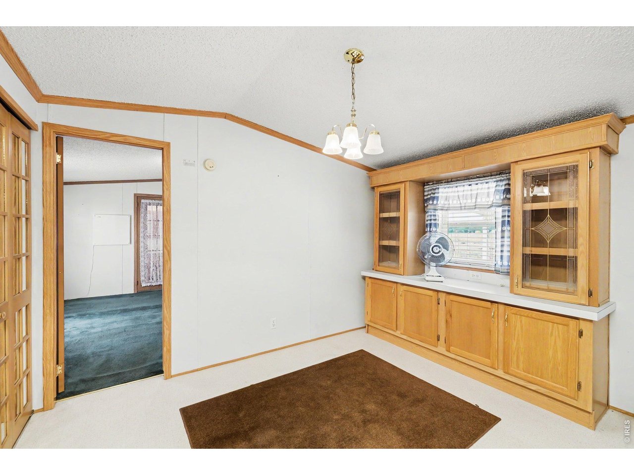 Property Photo 9 Full dining room with built-in cabinetry