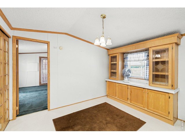 Property Photo 9 Full dining room with built-in cabinetry