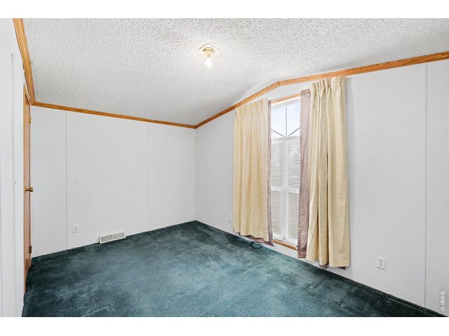 Property Photo 13 Another bedroom; bedrooms are separated from the primary