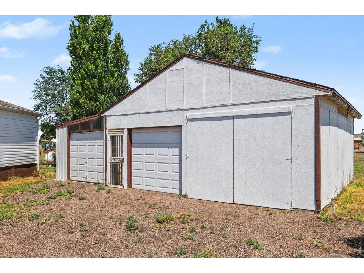 Property Photo 3 Outbuilding/Garage with boat storage and electricity