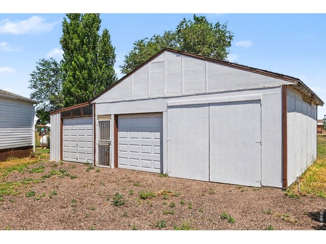 Property Photo 3 Outbuilding/Garage with boat storage and electricity