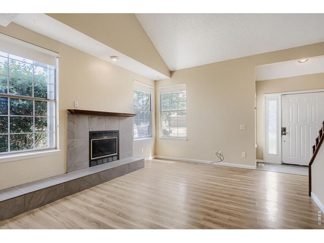 Property Photo 2 Bright living room with gas fireplace
