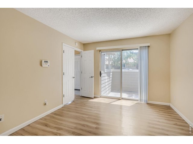 Property Photo 11 Main-level bedroom with private pato