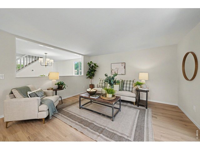 Property Photo 8 Family room highlighting a bright, open-concept layout.