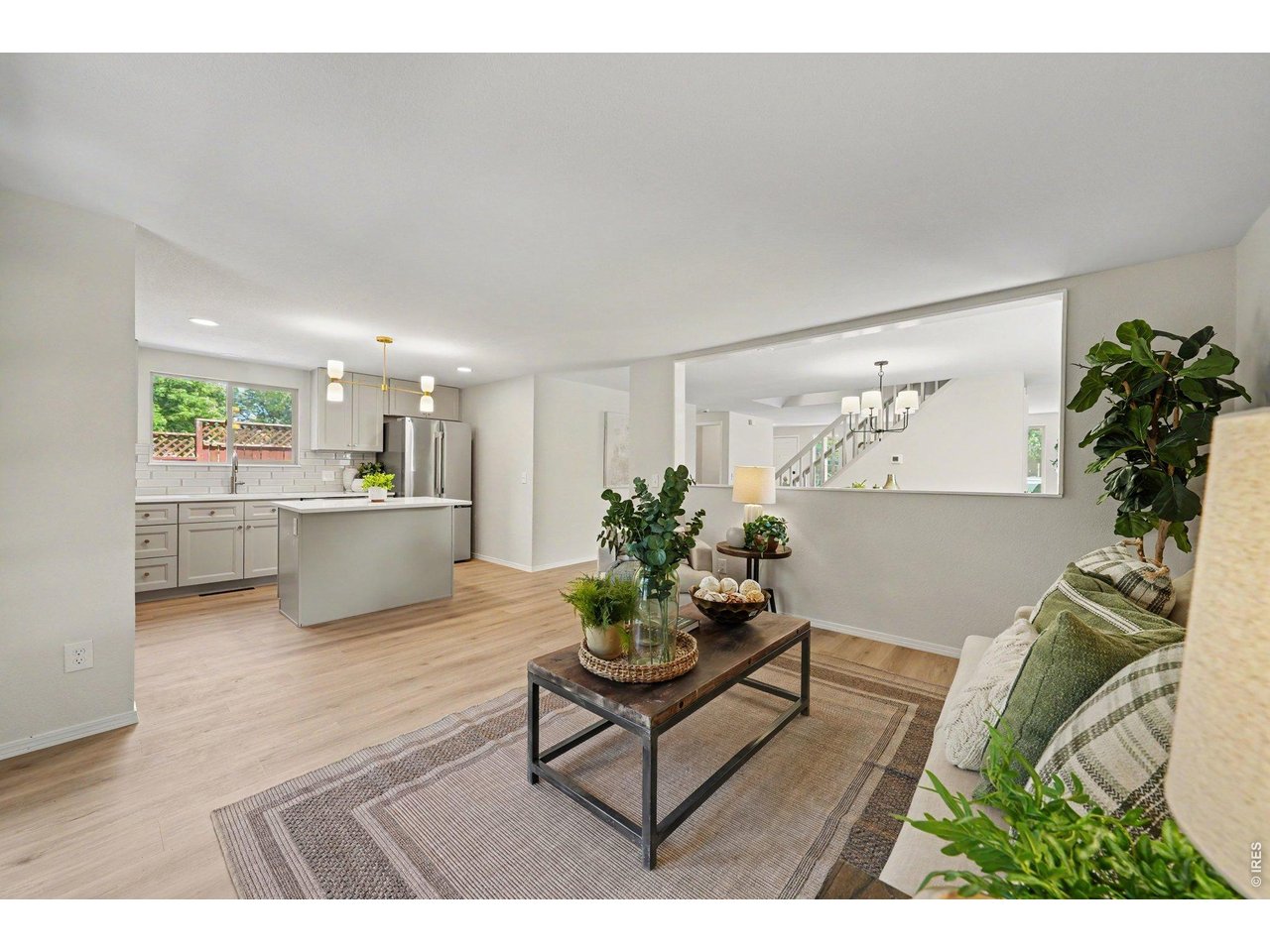 Property Photo 11 Seamless flow between the family room and updated kitchen.