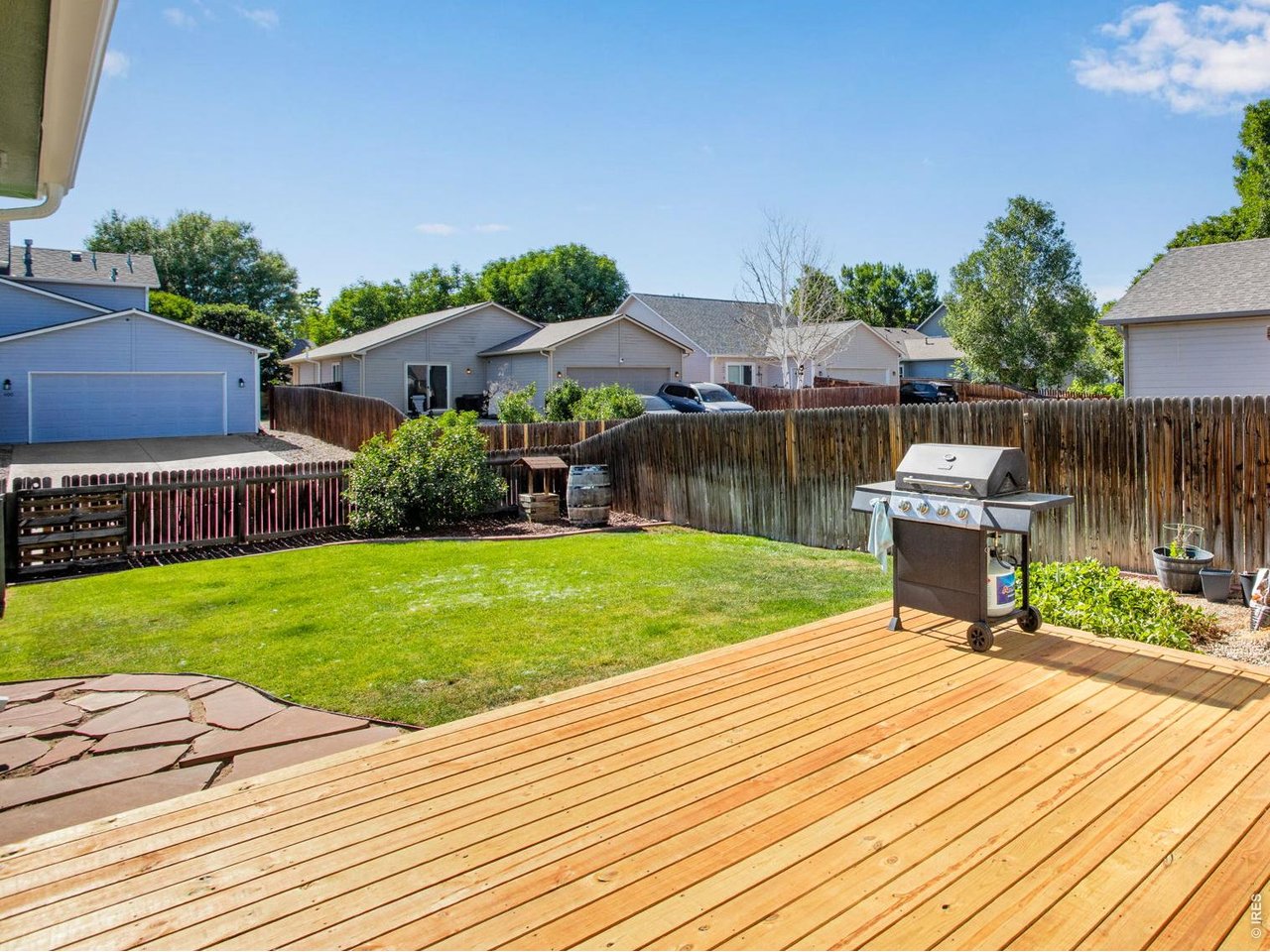 Property Photo 6 New wood deck with flagstone pathway