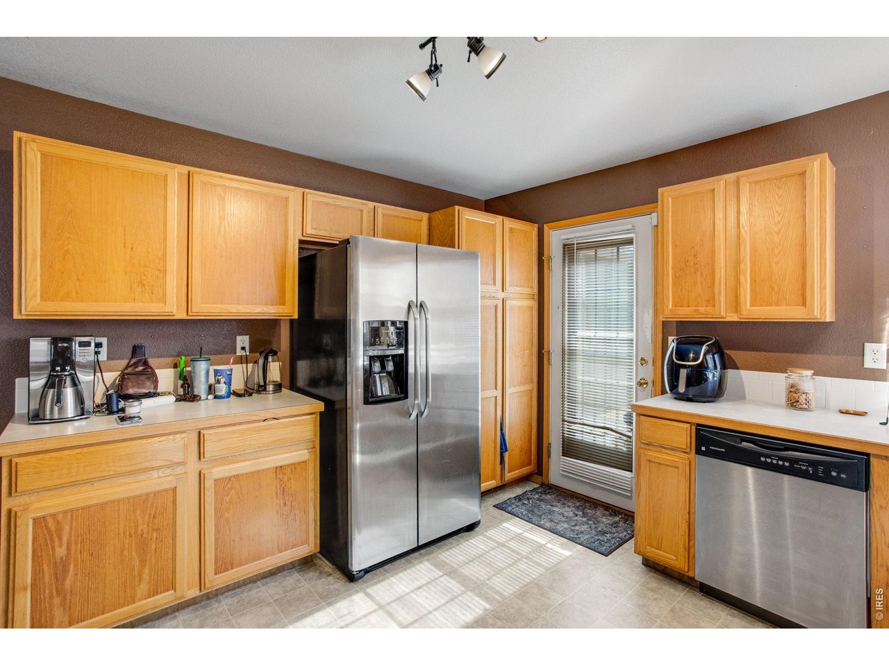 Property Photo 18 Kitchen with stainless steel appliances