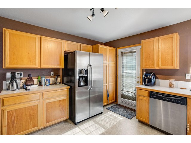 Property Photo 18 Kitchen with stainless steel appliances