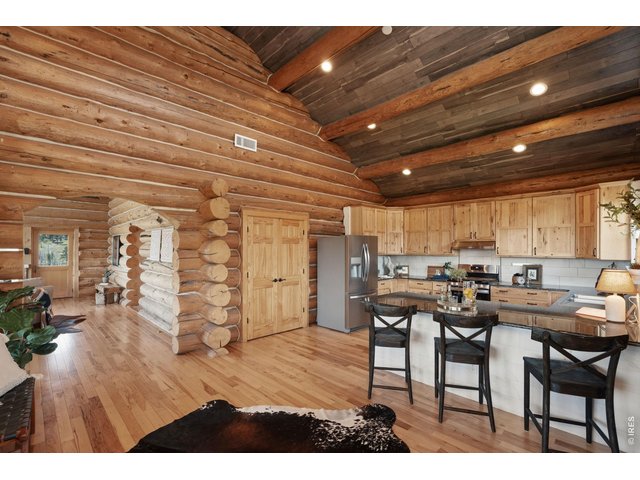 Property Photo 4 Kitchen with vaulted ceilings