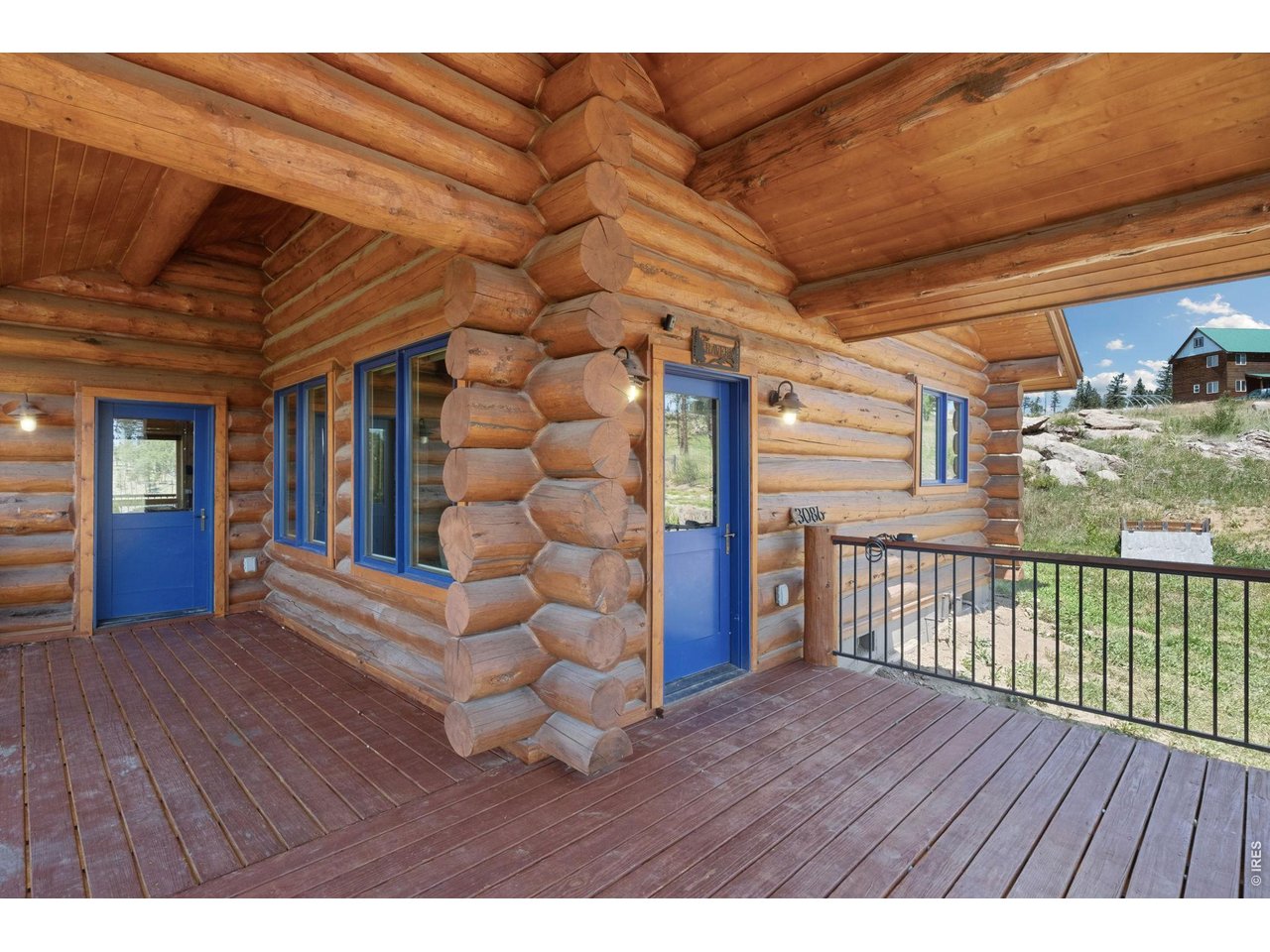 Property Photo 21 Front door and huge deck
