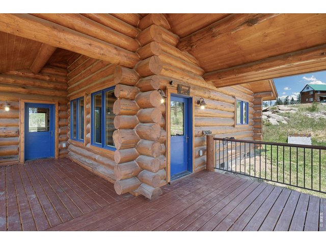 Property Photo 21 Front door and huge deck