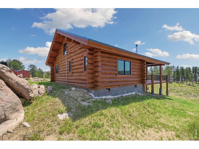 Property Photo 26 Full log exterior
