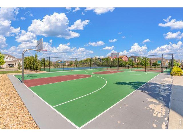 Property Photo 26 Basketball courts sit near the park area in this great neighborhood.