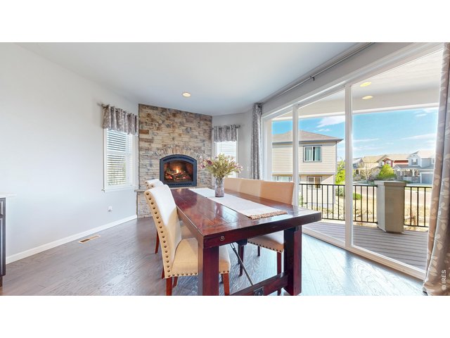 Property Photo 9 Dining room with fireplace
