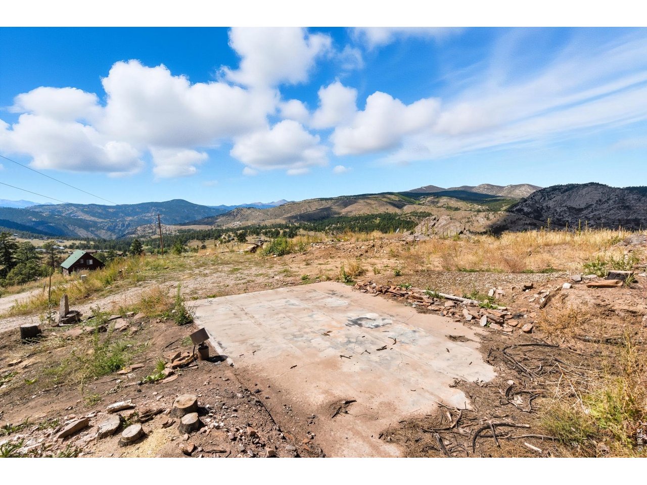 Property Photo 4 Site had a home on it that was burned down. Septic Vault system and well still on the property and functioning. Also, electricity is to the property. This is a site ready for your build!