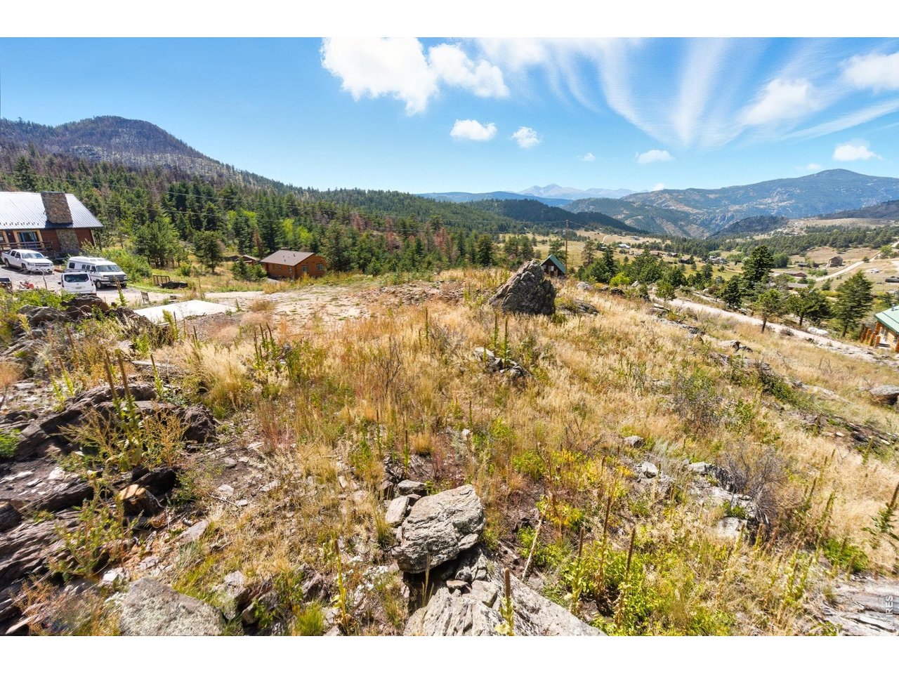 Property Photo 5 Looking west you have a perfect view of the Rockies with Long's Peak forefront.