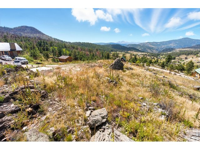 Property Photo 5 Looking west you have a perfect view of the Rockies with Long's Peak forefront.