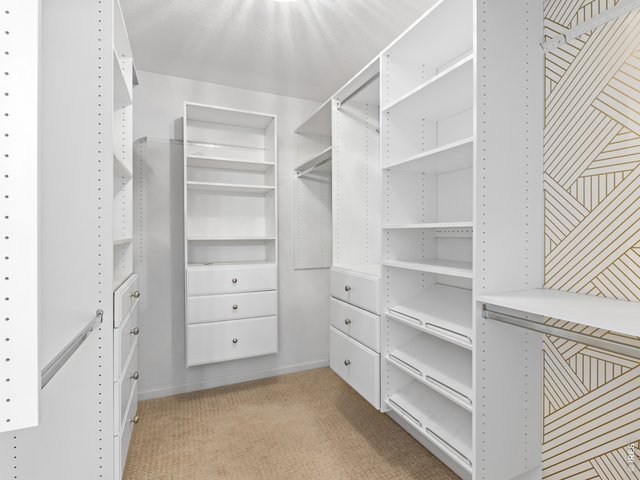 Property Photo 30 Walk in closet in the primary suite
