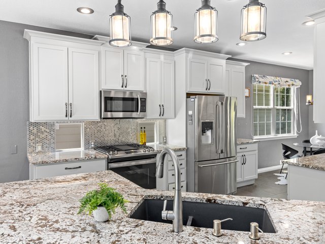 Property Photo 12 Great Kitchen layout with Granite Countertops & Stainless steel appliances